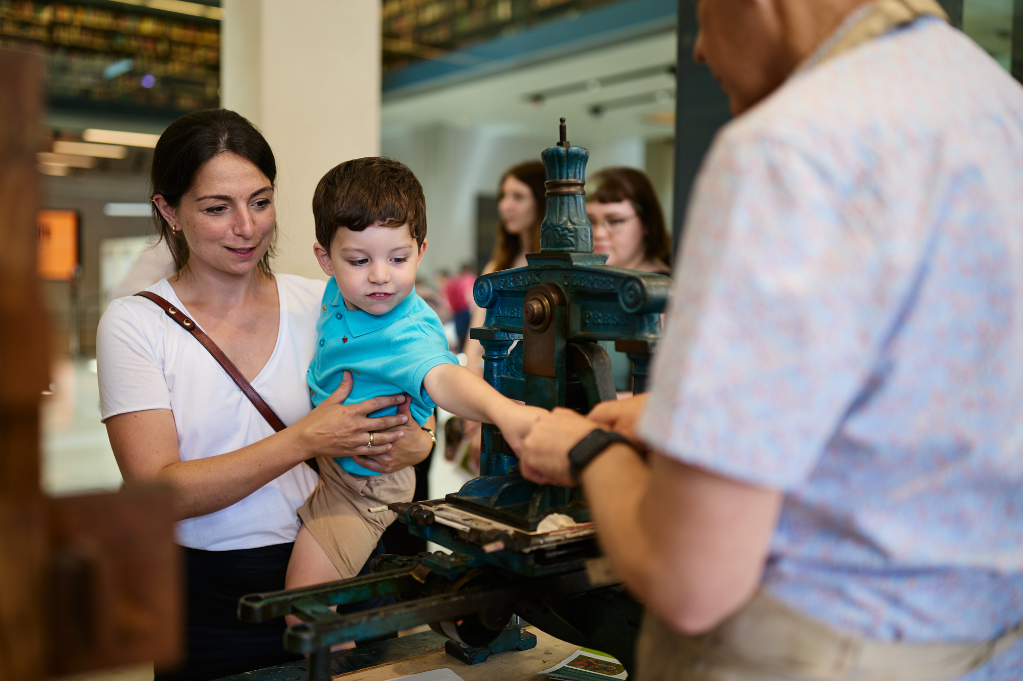 woman and child viewing exhibit at the Bodleian Libraries