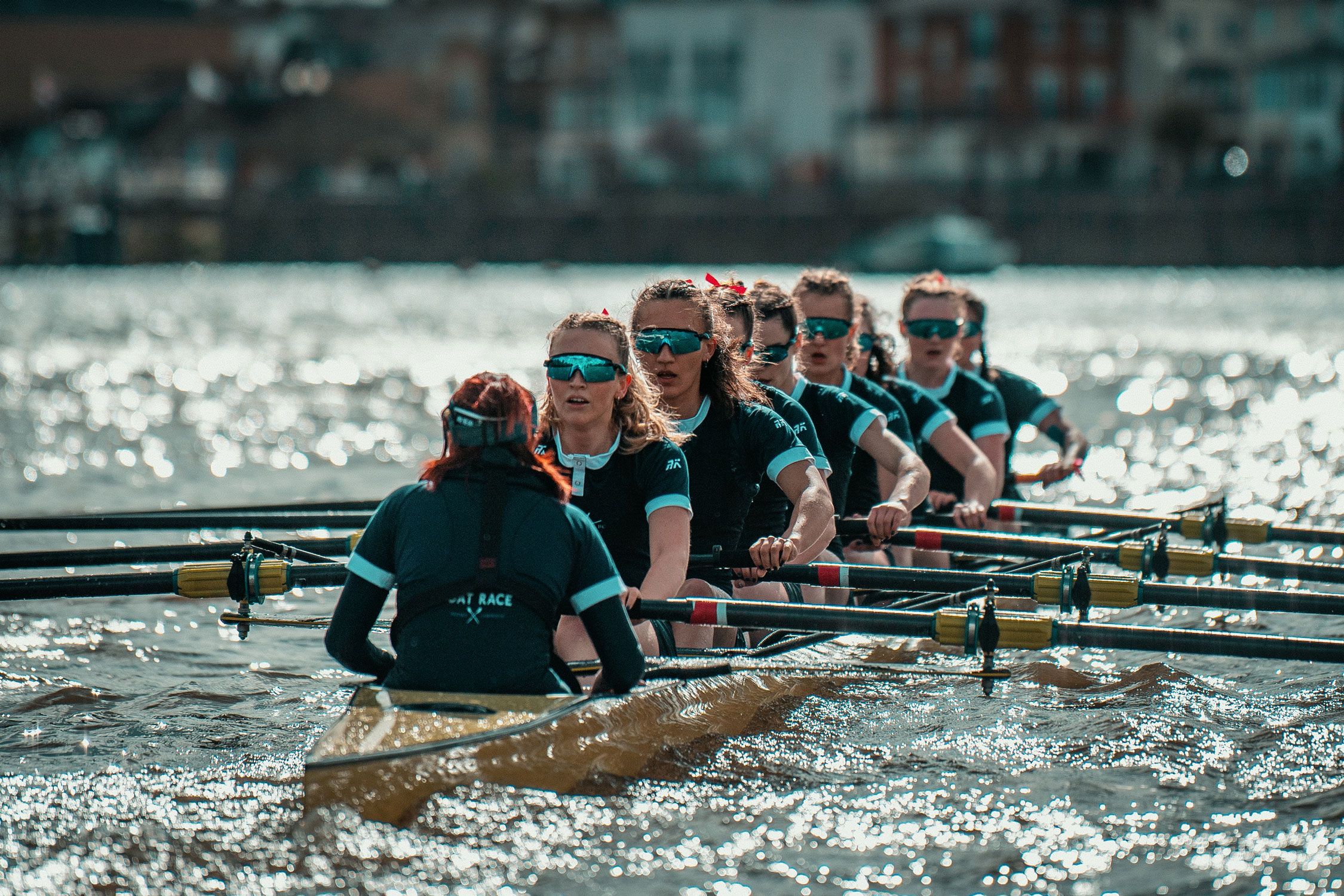 OUBC womens crew rowing on water